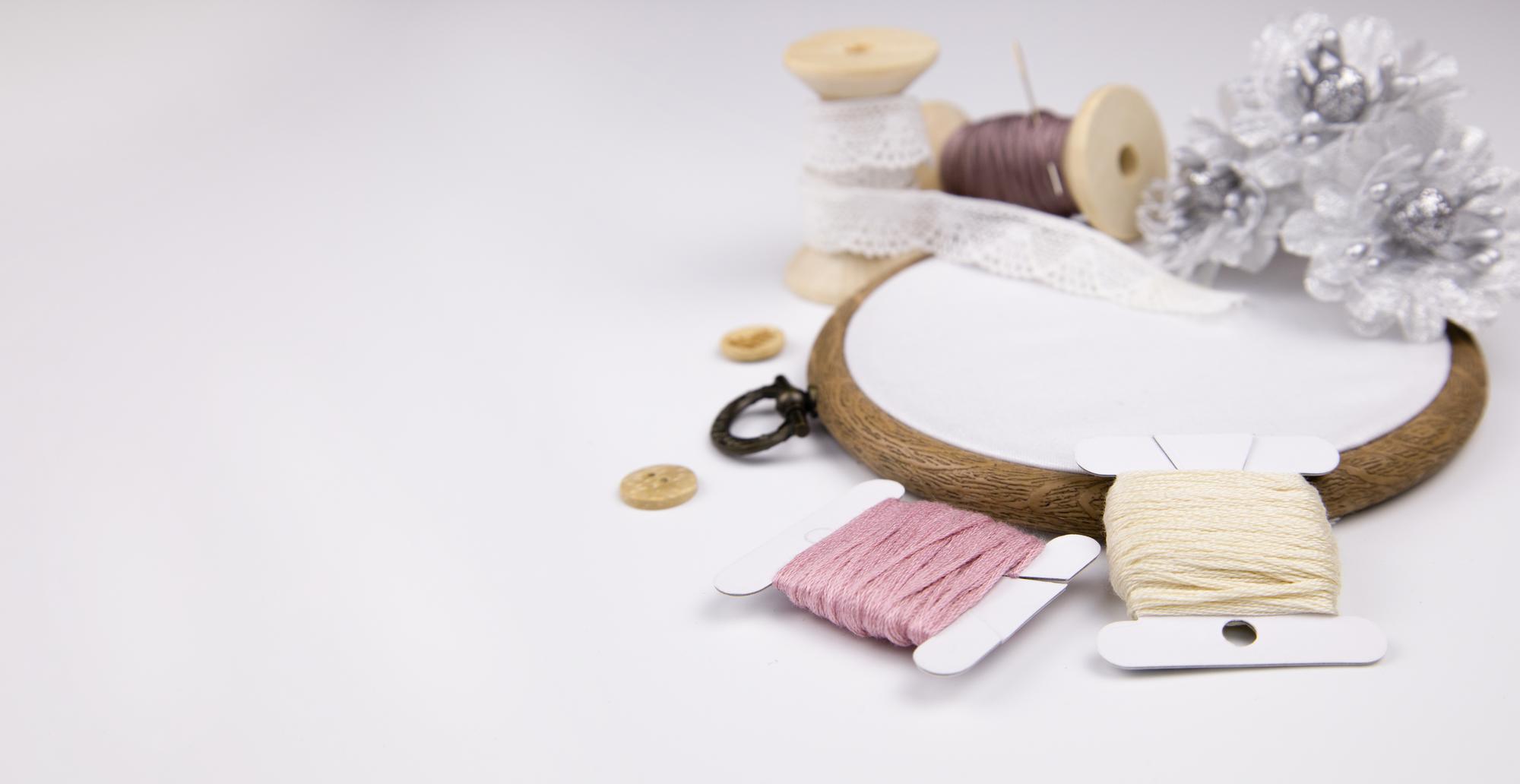 Workshop table with threads and needlework